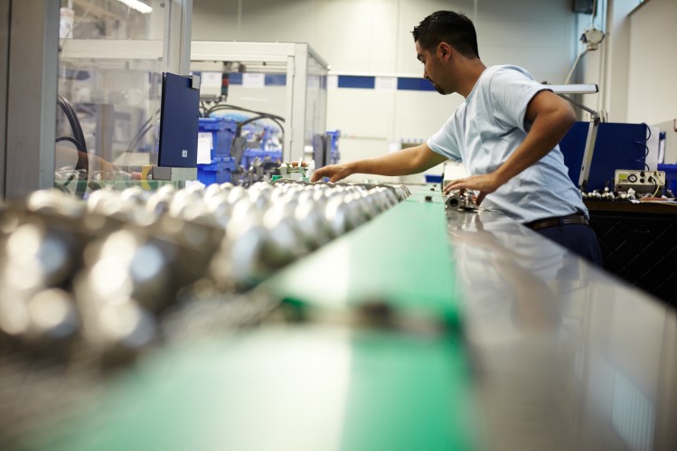 Worker at production line